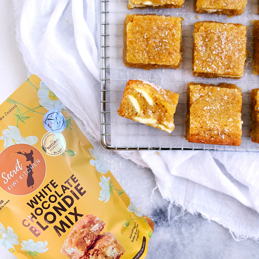 Secret Kiwi Kitchen blondie mix next to a rack with blondie squares